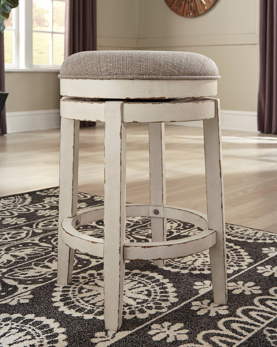 Realyn Counter Height Bar Stool - Evans Furniture (CO)