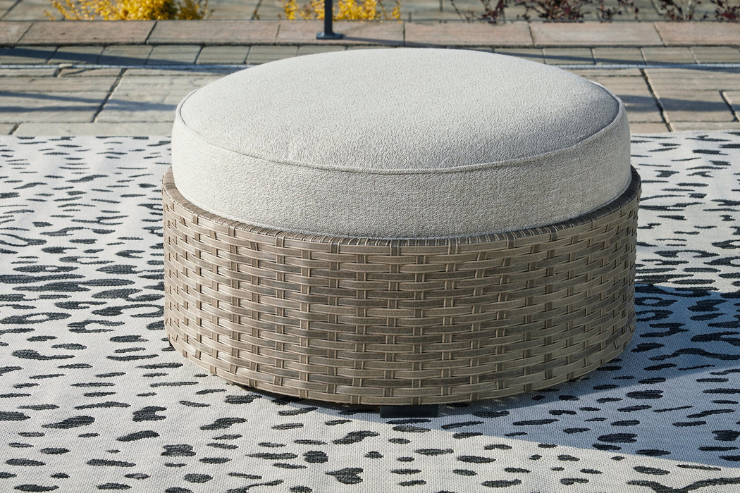 Calworth Outdoor Ottoman with Cushion - Evans Furniture (CO)