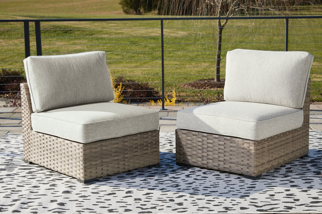 Calworth Outdoor Armless Chair with Cushion (Set of 2) - Evans Furniture (CO)