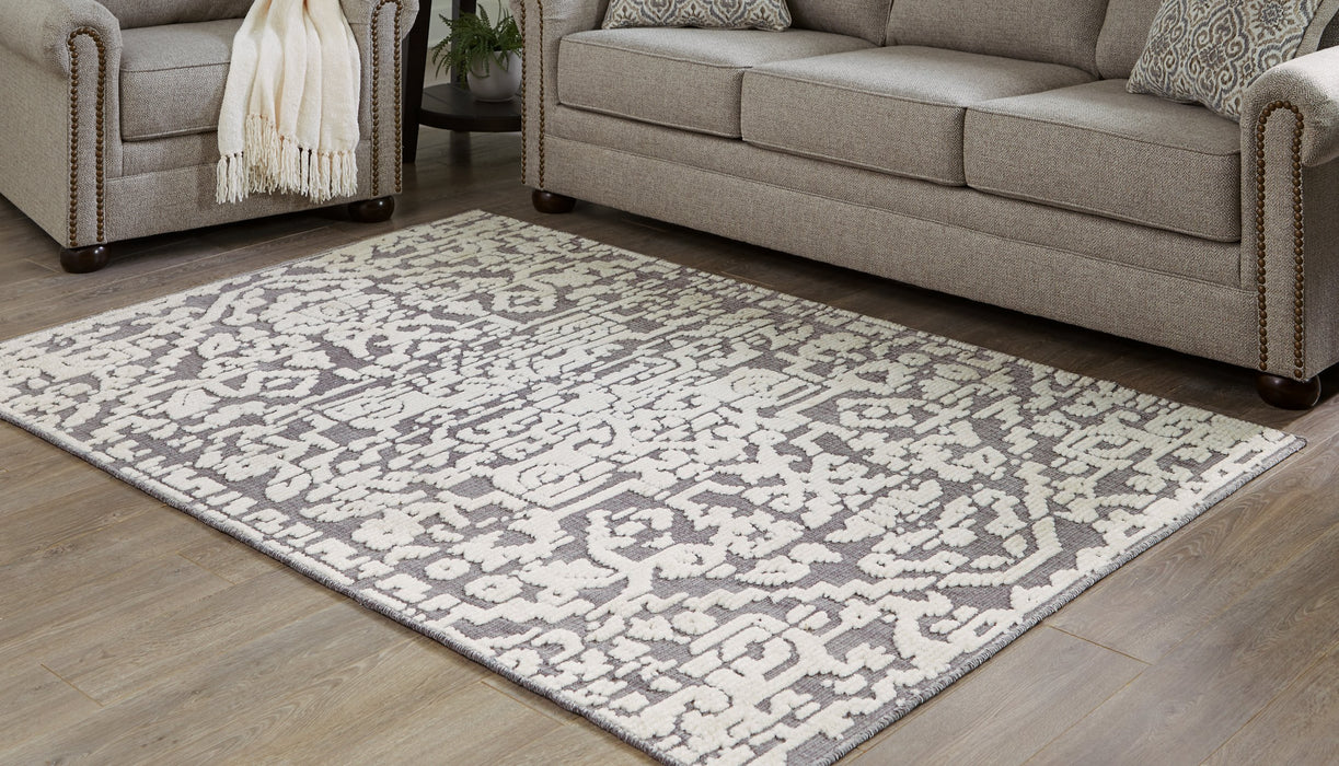 Oddetteley 4'11" x 7'2" Rug - Evans Furniture (CO)