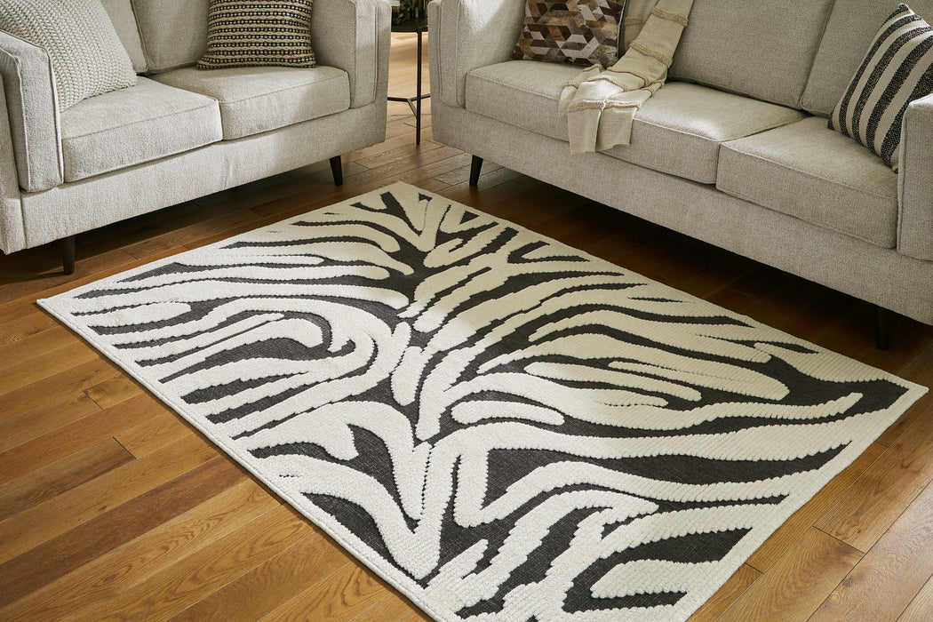 Thomwith 4'11" x 7'2" Rug - Evans Furniture (CO)