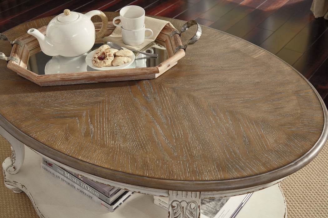 Realyn Coffee Table - Evans Furniture (CO)